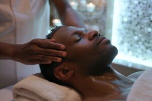 person enjoying scalp massage spa